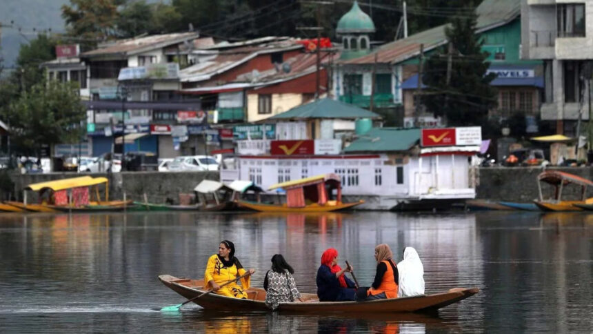 Kashmiri Women enjoying the Shikara Ride in Jehlum amid the heat wave, in Jammu and Kashmir, India.