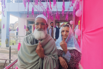 In Pic: an elderly couple votes for change and transformation of J&K.